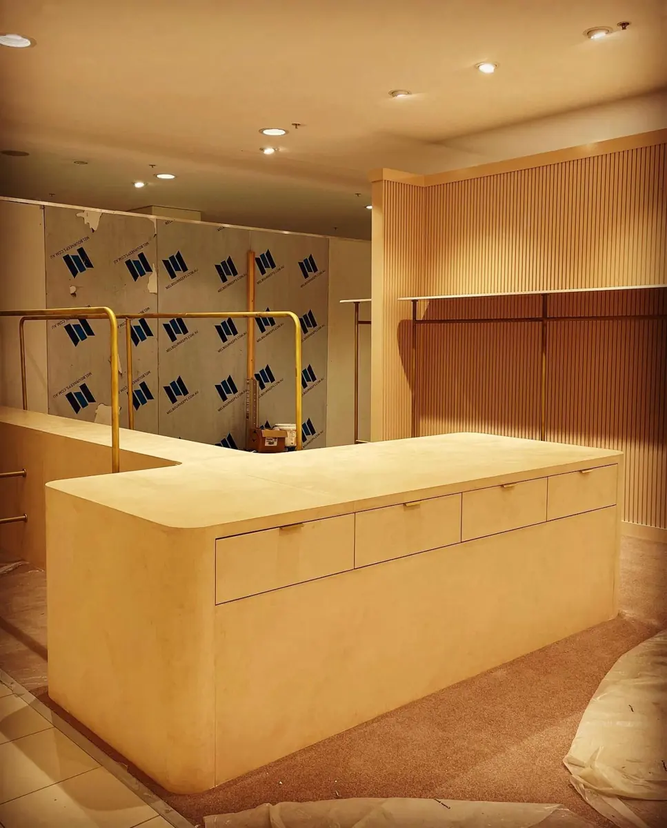 Microcement finish on a reception counter