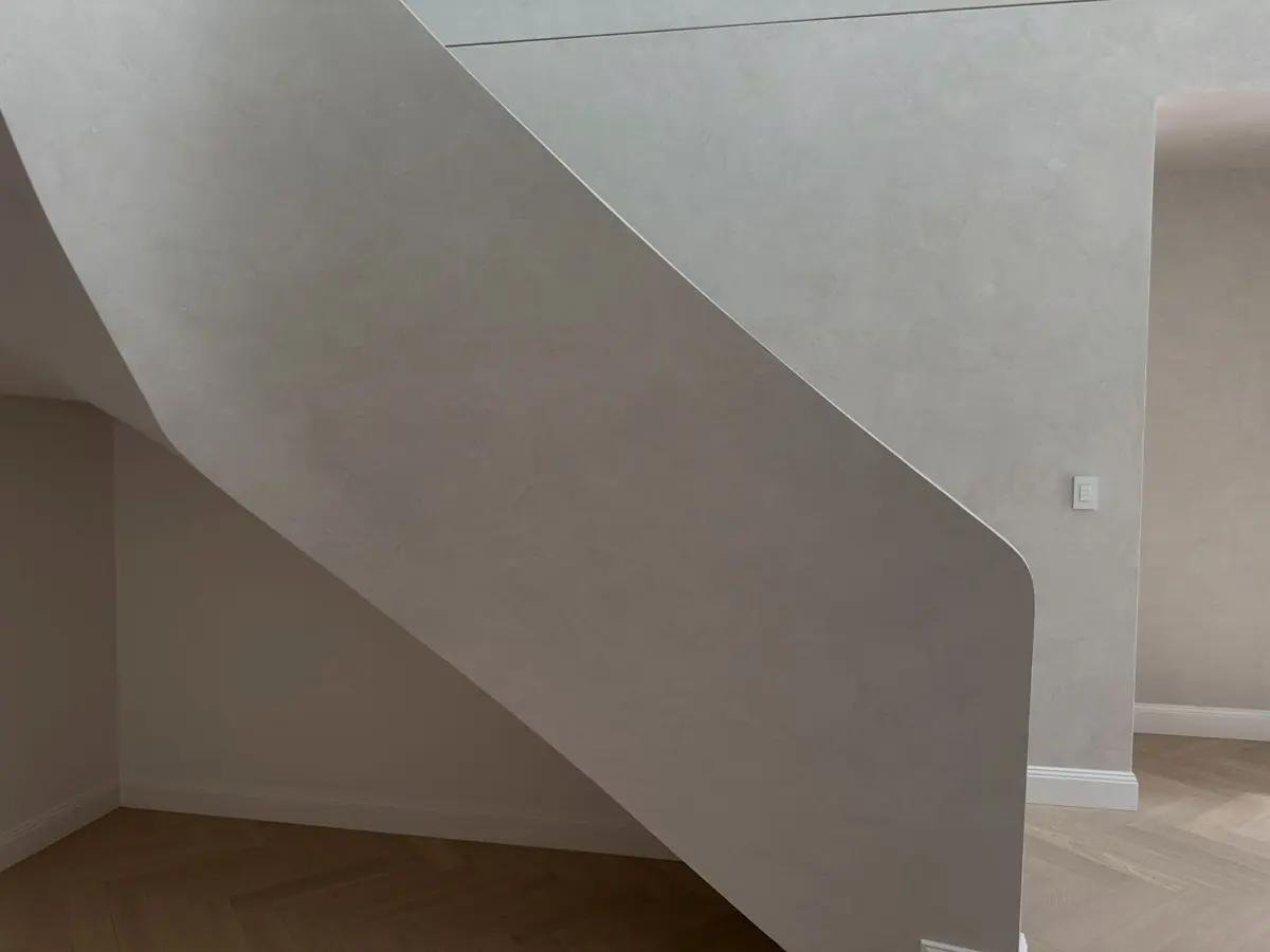 Marmorino Venetian plaster finish on a staircase wall